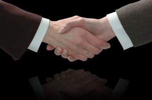 women in business, business shake hands